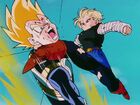 Android 18 kicks Vegeta in the jaw