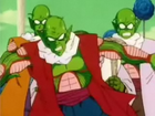 A Namekian protects the Elder Tsuno from Vegeta's attack