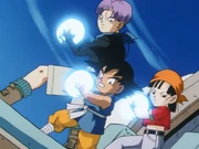 Goku, Pan, and Trunks charge a Multiple Kamehameha