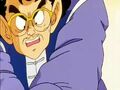 Gohan squeezing Mr. Shu's hand