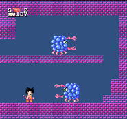 Son Goku enfrentando a un dúo de Cangrejos Monstruosos azules.