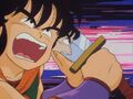 Yamcha attacks with his sword