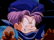 Le cae una piedra a Trunks.