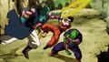 Saonel attacks Piccolo and Gohan with an energy blade