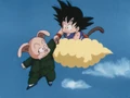 Goku catches Oolong as he falls