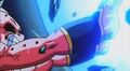 Kid Buu struggles with Goku's Super Spirit Bomb