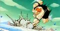 Recoome smashes into the ground as Vegeta dodges his attack