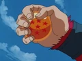 The Seven-Star Dragon Ball in Goku's hand