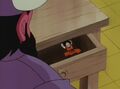 Goku in Yemma's desk