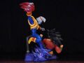 Imagination Series Baby versus Super Saiyan 4 Goku backside angle view