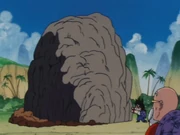 Goku proves to Roshi he can move the rock