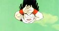 Gohan charges a Masenko to fire at Recoome