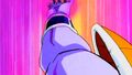 Ginyu swings his arm before striking himself with Holstein Shock energy punch