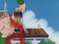 Goku dodges Tien Shinhan's attack