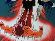 Goku kicks Vegeta