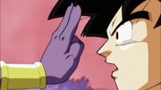 Beerus threatening Goku