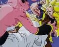 Super Saiyan 3 Goku kicks Kid Buu