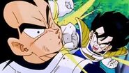 Gohan punches Vegeta in the face