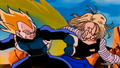 Android 18 damaged and with torn clothes blocks Vegeta's attack