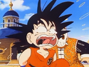 Goku in pain as his tail is ripped off