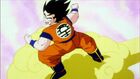 Goku racing to a battlefield on the Nimbus