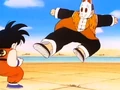 The Masked Man backs away after seeing Goku absorb his kick