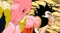 Super Buu punches Ultimate Gohan
