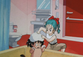 Bulma giving Goku a bath