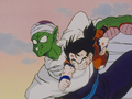 Gohan punches Piccolo in the face