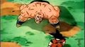 Nappa holding his stomach to try and ease the pain