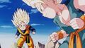 Goten and Trunks sense a high power level and plan to head towards it