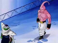 Piccolo and Super Buu walking down a hallway inside the Lookout