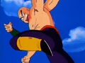 Tien jumping over Goku