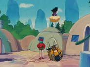Bulma y Goku llegan a la ALdea Aru.