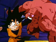 A Bio-Warrior biting Goten's hand in Bio-Broly