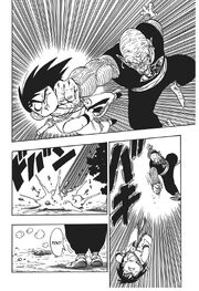 Demon King Piccolo punches Goku into the ground