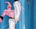 Super Buu kicks Gotenks up into the air