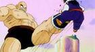 Nappa kicking Gohan in the stomach