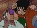 Yamcha battles a man inside a dojo