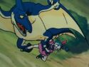 The pterodactyl flies away with Bulma