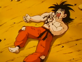 Goku suffering from the immense chest wound