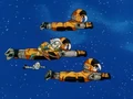 Goku, Trunks, Giru, and Pan flying in space