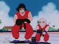 Yamcha and Krillin lift Goku's weigted T-shirt and boot