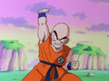 Krillin charges a Destructo Disk