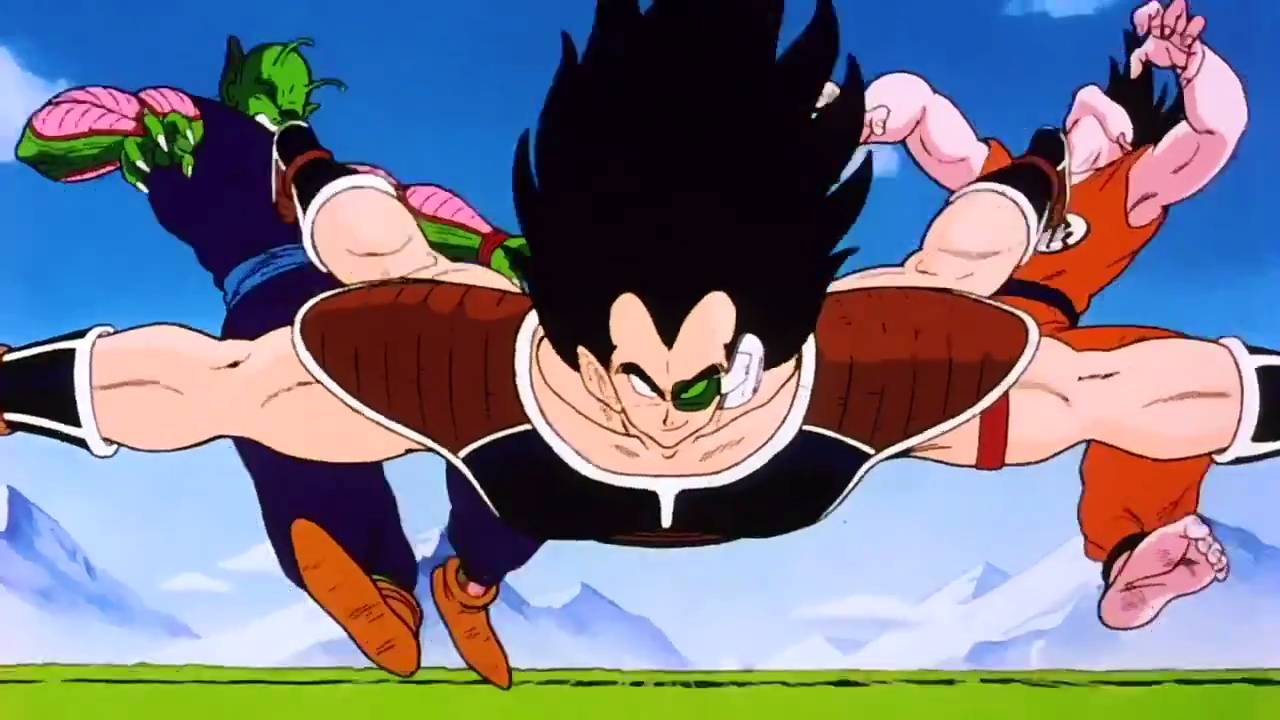 Raditz faces away from his opponent, then as they charge towards him to... 