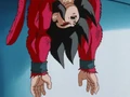 Closeup of Super Saiyan 4 Goku hanging unconscious after Syn Shenron's attack