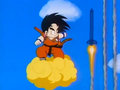 Goku flies away from the rockets