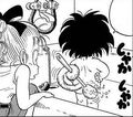 Goku scrubbing himself in a bath