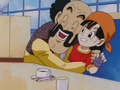 Mr. Satan coddling Pan after telling her he will treat her like an adult