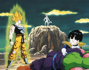 A terrified Gohan looks on as Goku prepares to make Frieza pay for his evil deeds